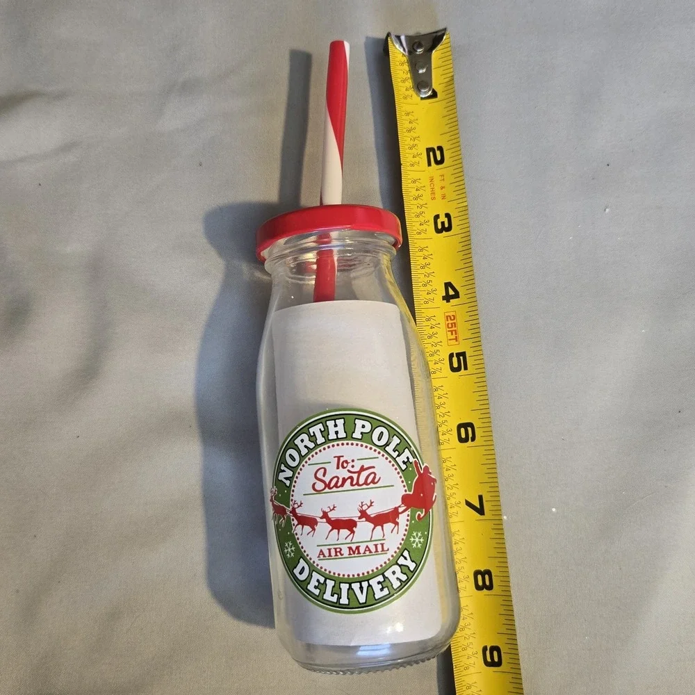 North Pole Delivery Santa Glass Milk Bottle Red Lid Straw Christmas Holiday